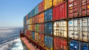 stacked multi-colored containers on a ship